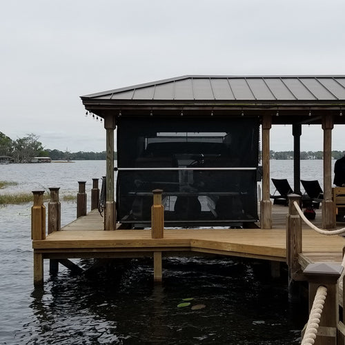 ShoreScreen power curtain for a boat dock