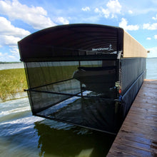 Shore Station revolution canopy cover with ShoreScreen side curtain on a freestanding boat lift