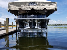 Manual ShoreStation boat lift with a legacy canopy cover
